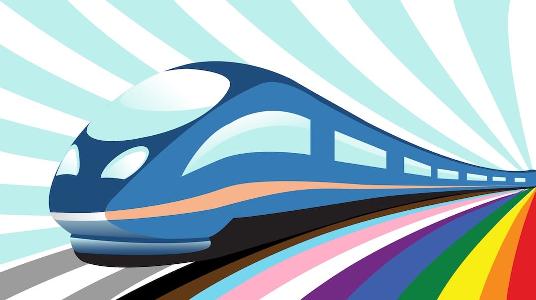 Image shows a cartoon train on a rainbow